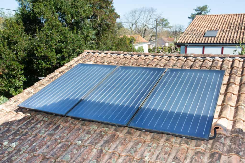 Shaded panels on roof proving that solar panels can charge in the shade.