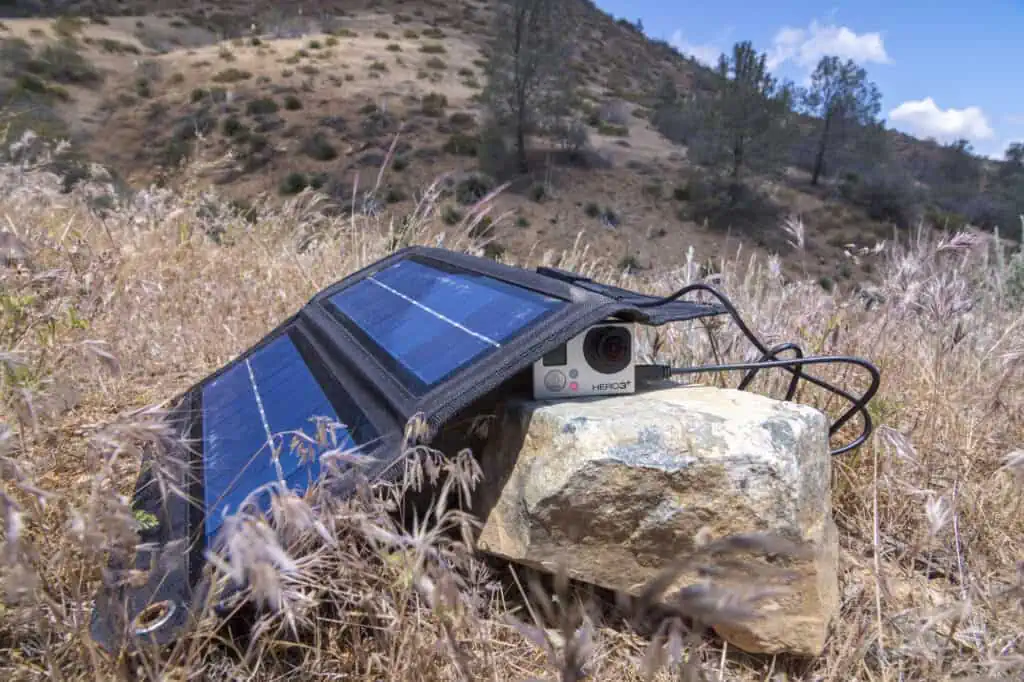 Using the best solar charger for lithium-ion battery to charge a GoPro camera.