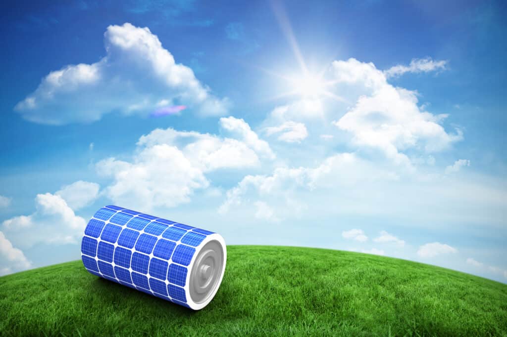 Solar battery under a bright blue sky demonstrating the benefits of using solar batteries.